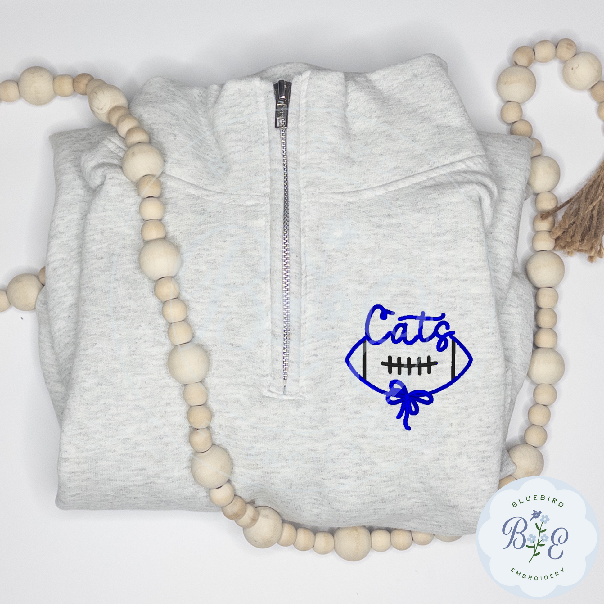 Custom Quarter Zip Embroidered Football Bow Mascot Logo