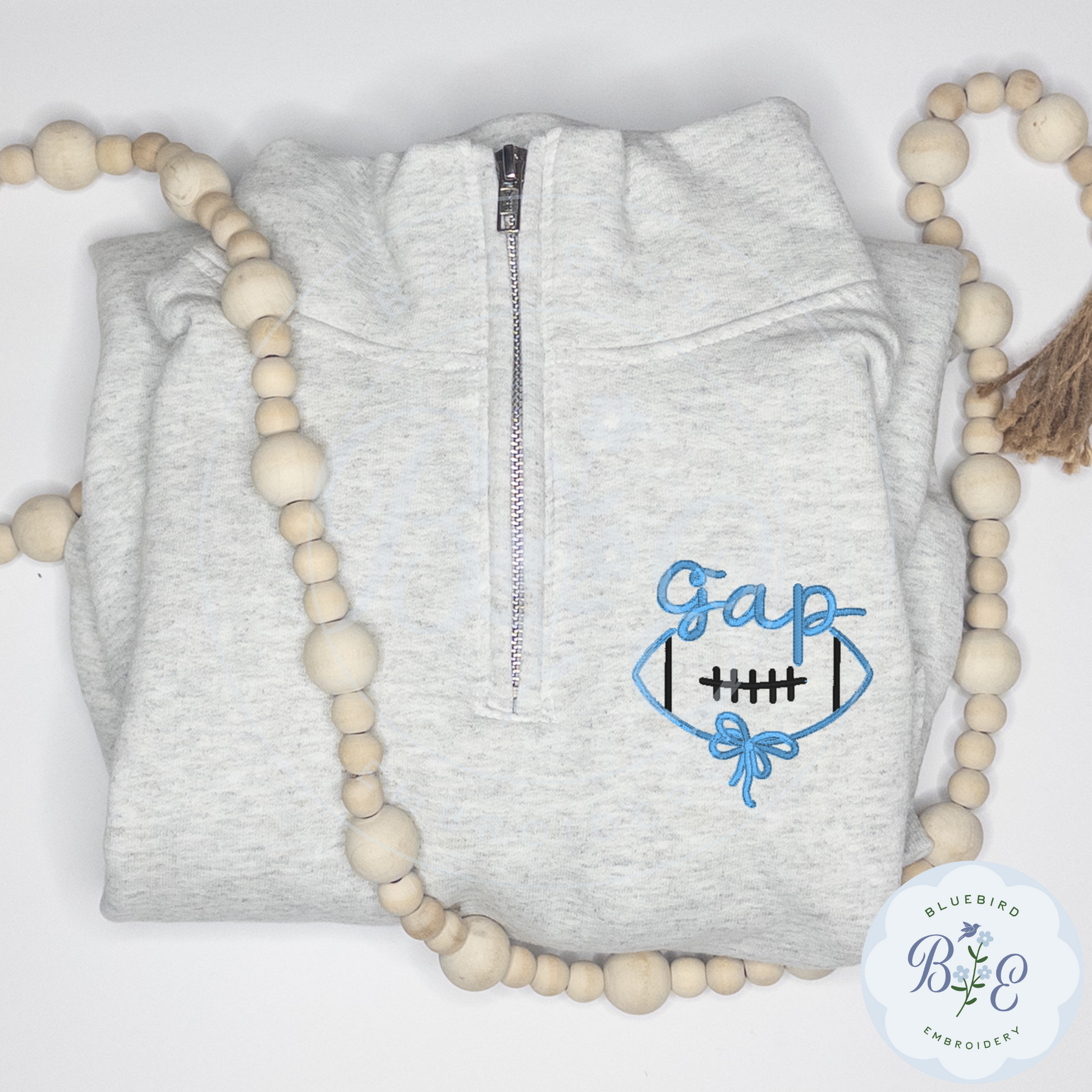 Custom Quarter Zip Embroidered Football Bow Mascot Logo