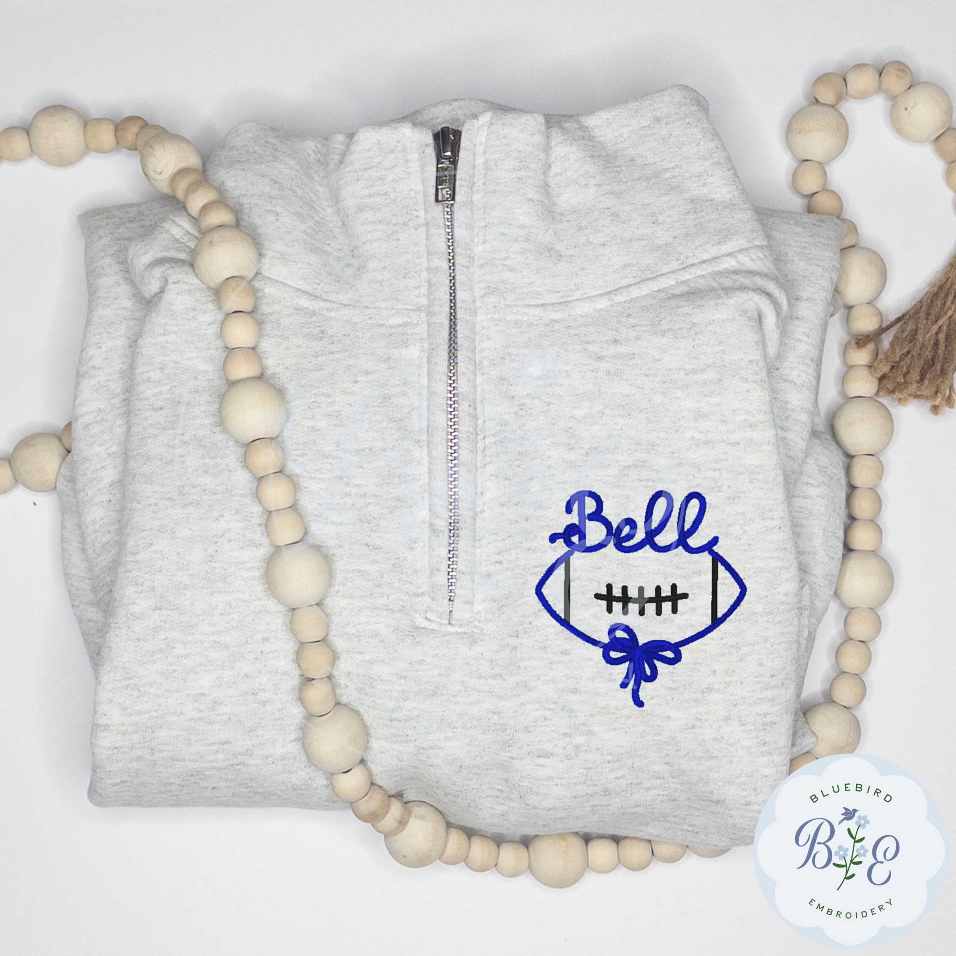 Custom Quarter Zip Embroidered Football Bow Mascot Logo